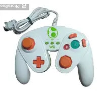 WIIU: PDP WIRED FIGHT PAD YOSHI EIDITION